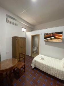 Postel nebo postele na pokoji v ubytování Tranvía Beach House