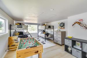 a room with a table with a chessboard at Chehalis Getaway with Golf Course View and Fire Pit! in Chehalis
