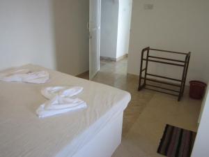 Postel nebo postele na pokoji v ubytování Anicia Beach House