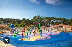 a water park with a bunch of water slides at Mobile Home Village Vacances Océan et Nature in Seignosse