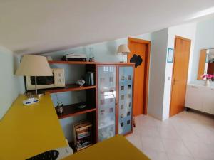 Kuchyň nebo kuchyňský kout v ubytování Casa di Arturo Mansarda