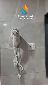 a rendering of a hair dryer on a wall at RUM iSLAND LUXURY CAMP in Wadi Rum