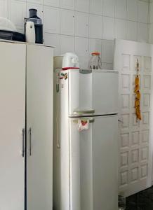 Køkken eller tekøkken på Tá em Casa Peruíbe