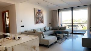 Superbe appartement de luxe a l'hivernage marrakechにあるシーティングエリア