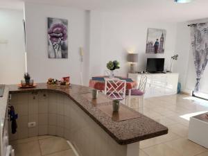 TV a/nebo společenská místnost v ubytování Apartamento Angel Pto Santiago