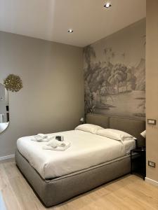 Postel nebo postele na pokoji v ubytování Bieffegi Luxury Suite