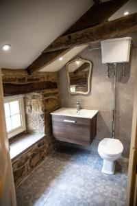 Ванная комната в The Footmans Cottage