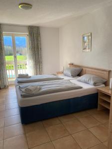 Postel nebo postele na pokoji v ubytování Appartementresidenz König Ludwig + 37 fotografií