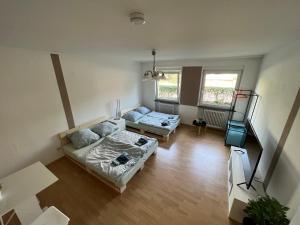an aerial view of a living room with a couch at Privatzimmer nähe Residenz und Innenstadt in Würzburg