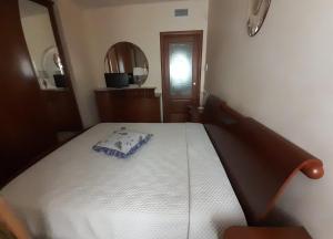 Ένα ή περισσότερα κρεβάτια σε δωμάτιο στο CUORE DEL SUD