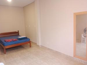 En eller flere senge i et værelse på Hostel espaço Barra funda 2