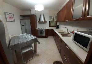 Η κουζίνα ή μικρή κουζίνα στο CUORE DEL SUD