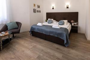 Posteľ alebo postele v izbe v ubytovaní Csillag Villa