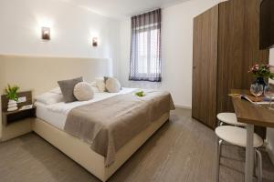 Posteľ alebo postele v izbe v ubytovaní Csillag Villa