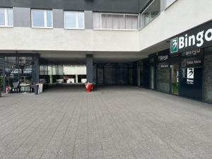 an empty parking lot in a large building at Apartman Bloom in Sarajevo