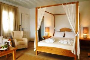 Postel nebo postele na pokoji v ubytování Petali Village Hotel