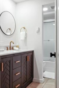 a bathroom with a sink and a mirror at Cozy Hideaway Retreat Unit 4 near Durango in Durango
