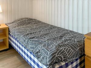 Llit o llits en una habitació de Holiday home BÅSTAD II