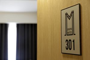 Certifikát, hodnocení, plakát nebo jiný dokument vystavený v ubytování Hotel M