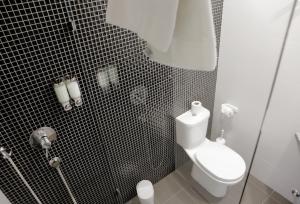 Koupelna v ubytování Hotel M
