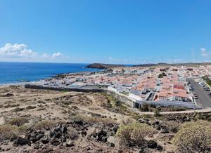 an aerial view of a resort near the ocean at Apartamento Abades Playa & Relax in Abades