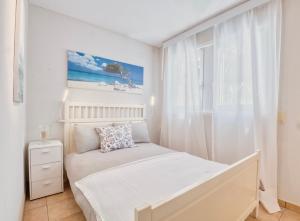 Postel nebo postele na pokoji v ubytování Casa Alla Roccabella