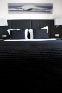 Postel nebo postele na pokoji v ubytování Hotel M