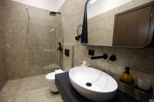 Vannituba majutusasutuses CLOUD 5 Blloku Rooms Tirana