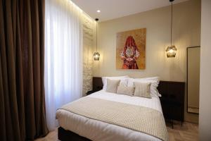 Voodi või voodid majutusasutuse CLOUD 5 Blloku Rooms Tirana toas