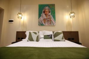 Voodi või voodid majutusasutuse CLOUD 5 Blloku Rooms Tirana toas