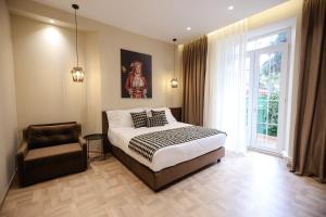 Voodi või voodid majutusasutuse CLOUD 5 Blloku Rooms Tirana toas