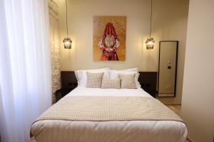 Voodi või voodid majutusasutuse CLOUD 5 Blloku Rooms Tirana toas