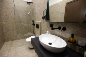 Vannituba majutusasutuses CLOUD 5 Blloku Rooms Tirana