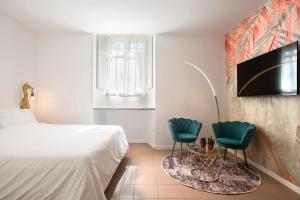 Posteľ alebo postele v izbe v ubytovaní Sant'Agnese Metro Apartment