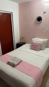 Postel nebo postele na pokoji v ubytování Hotel Margarita