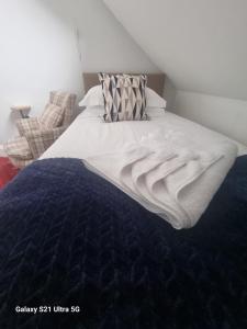 Postel nebo postele na pokoji v ubytování St Leonards Guest House