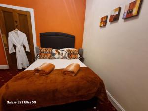 Postel nebo postele na pokoji v ubytování St Leonards Guest House