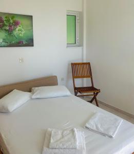 Postel nebo postele na pokoji v ubytování Tasos Manaritsas Rooms