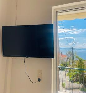 TV a/nebo společenská místnost v ubytování Tasos Manaritsas Rooms