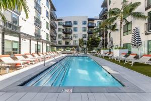 a swimming pool in the middle of a building at Luxury Home in Hollywood with Pool I Gym I Free Parking in Los Angeles