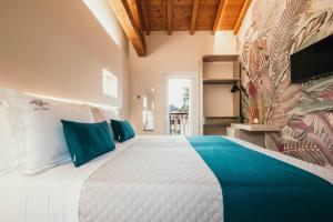 Postel nebo postele na pokoji v ubytování Gio Leo Guest House