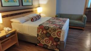 Lets Idea Hotel Flat Particular客房内的一张或多张床位