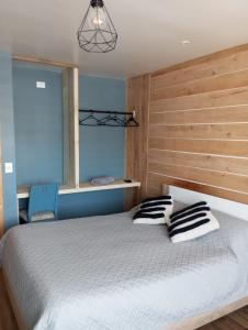 Postel nebo postele na pokoji v ubytování Casa Boqui Hostal