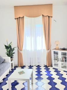 Postel nebo postele na pokoji v ubytování DEPENDACE MINORI MARE **** + 4 fotografie