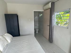 Voodi või voodid majutusasutuse Hofi Paradise Resort toas