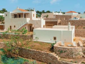a view of a house with a stone wall at Casa Kombonada in Kythira