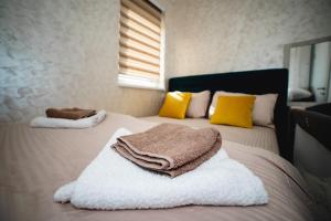 Postel nebo postele na pokoji v ubytování Apartman VELUK