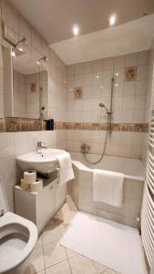 Et badeværelse på Innere Stadt Apartment (am Ring)