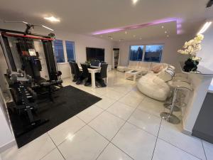 a living room with a hair dryer and a salon at Magnifique villa avec piscine chauffée in Cauroy-lès-Hermonville