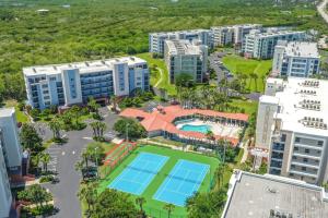 an aerial view of a city with tennis courts at Oceanwalk 10-203 in New Smyrna Beach